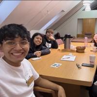 Students gathered around a table