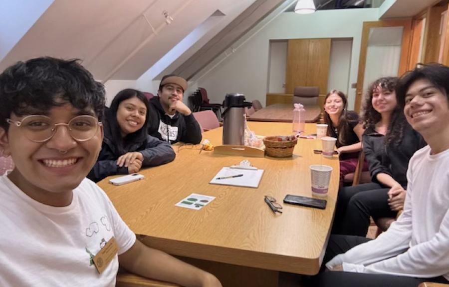 Students gathered around a table