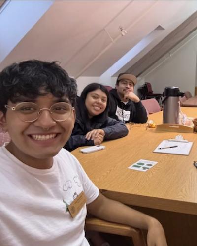 Students gathered around a table