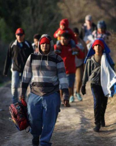 People walking - Photograph: Julio Cesar Aguilar/AFP/Getty Images