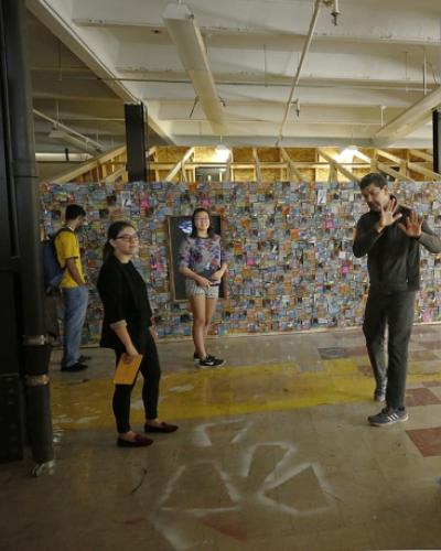 Picture of artist and educator Pepón Osorio&#039;s display with students